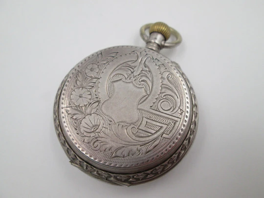 Hunter-case pocket watch. Sterling silver. Ornate lids. Stem-wind / pin-set. Swiss. 1900's