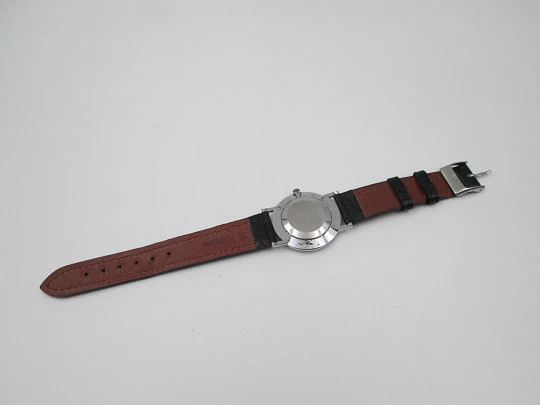 Jean Perret Genève. Steel & chromed metal. Manual winding. Leather strap. Swiss. 1960's