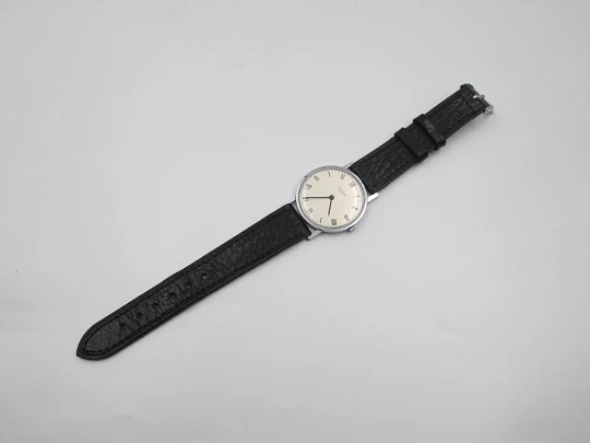 Jean Perret Genève. Steel & chromed metal. Manual winding. Leather strap. Swiss. 1960's