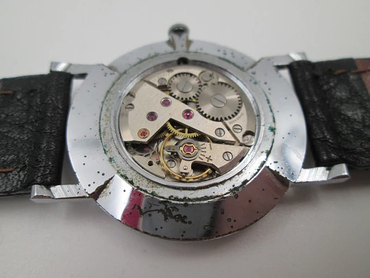 Jean Perret Genève. Steel & chromed metal. Manual winding. Leather strap. Swiss. 1960's