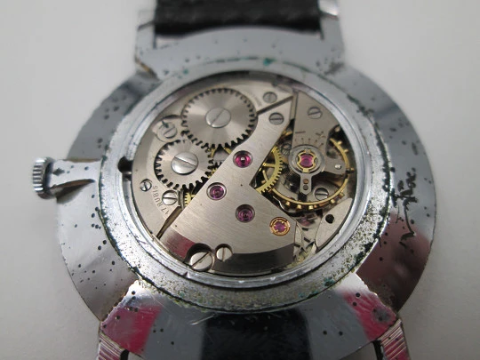 Jean Perret Genève. Steel & chromed metal. Manual winding. Leather strap. Swiss. 1960's