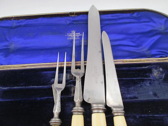 Joseph Rodgers & Sons victorian carving set. Ivory, steel and sterling silver. England. 1870's