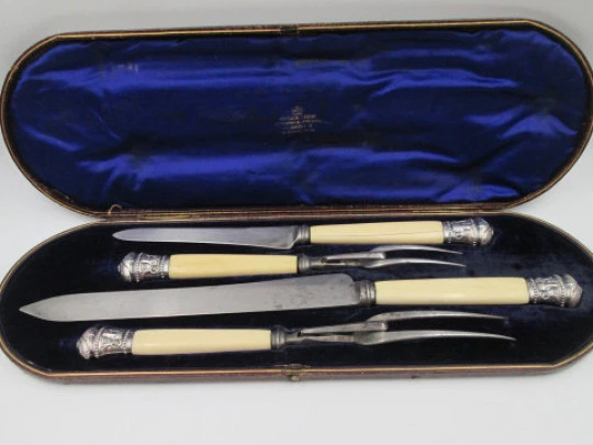 Joseph Rodgers & Sons victorian carving set. Ivory, steel and sterling silver. England. 1870's