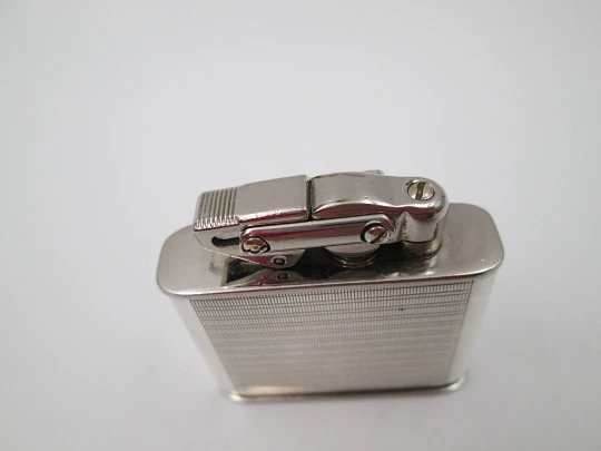 Karl Wieden 800 pocket petrol lighter. Sterling silver. Linear motifs. Germany. 1930's