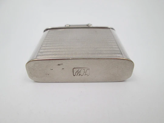 Karl Wieden 800 pocket petrol lighter. Sterling silver. Linear motifs. Germany. 1930's