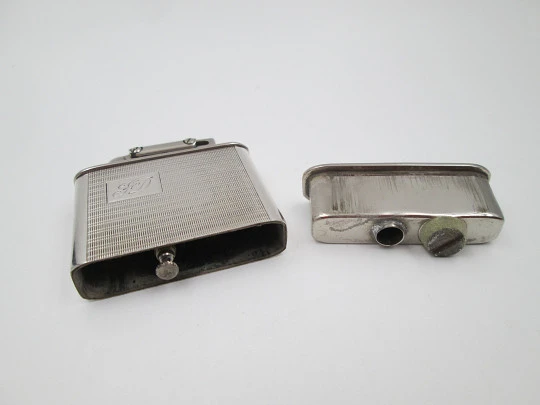 Karl Wieden 800 pocket petrol lighter. Sterling silver. Linear motifs. Germany. 1930's