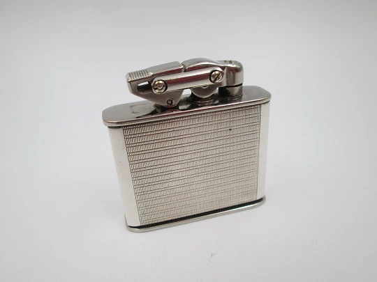 Karl Wieden 800 pocket petrol lighter. Sterling silver. Linear motifs. Germany. 1930's