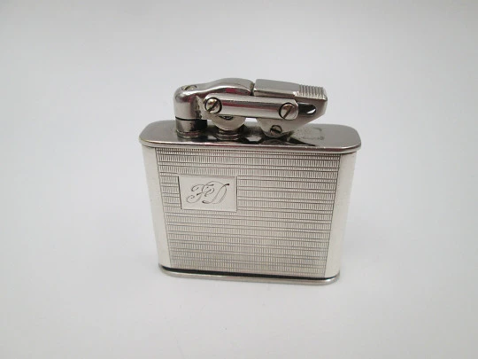 Karl Wieden 800 pocket petrol lighter. Sterling silver. Linear motifs. Germany. 1930's