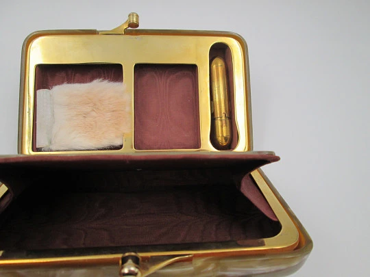 Ladie's vanity handbag. Marble celluloid and gold plated metal. United States. 1950's