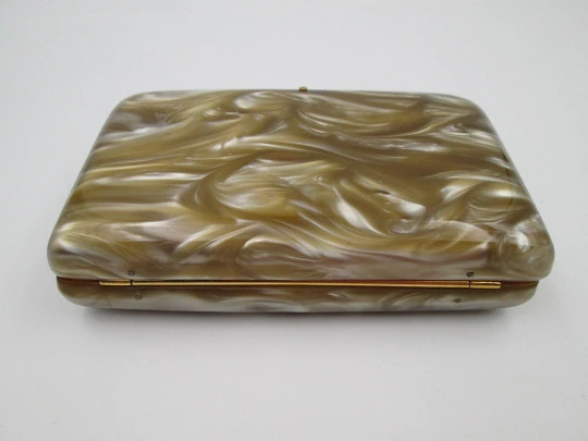 Ladie's vanity handbag. Marble celluloid and gold plated metal. United States. 1950's