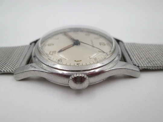 Longines militar. Acero inoxidable. Cuerda manual. Escala minutos. Brazalete. 1950