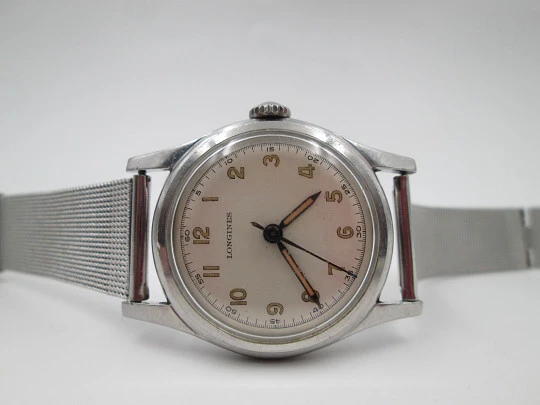 Longines militar. Acero inoxidable. Cuerda manual. Escala minutos. Brazalete. 1950