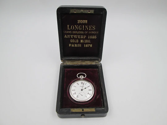 Longines open-faced pocket watch. Chromed steel. Manual wind. Wood box. 1960's. Swiss