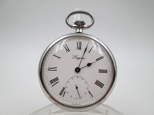 Longines open-faced pocket watch. Chromed steel. Manual wind. Wood box. 1960's. Swiss