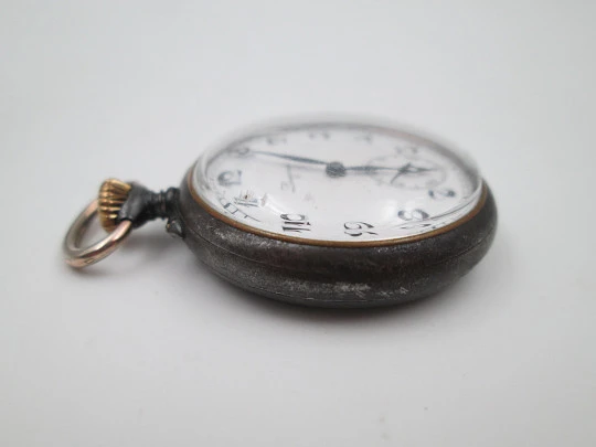 Longines open-faced pocket watch. Iron and gold plated. Stem-wind. Porcelain dial. 1890's