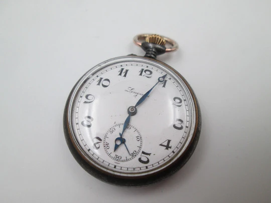 Longines open-faced pocket watch. Iron and gold plated. Stem-wind. Porcelain dial. 1890's