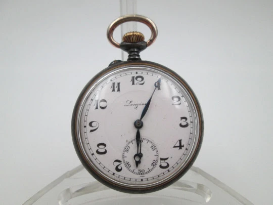 Longines open-faced pocket watch. Iron and gold plated. Stem-wind. Porcelain dial. 1890's