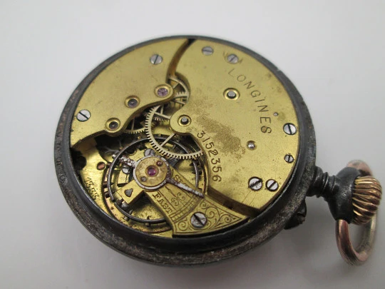 Longines open-faced pocket watch. Iron and gold plated. Stem-wind. Porcelain dial. 1890's