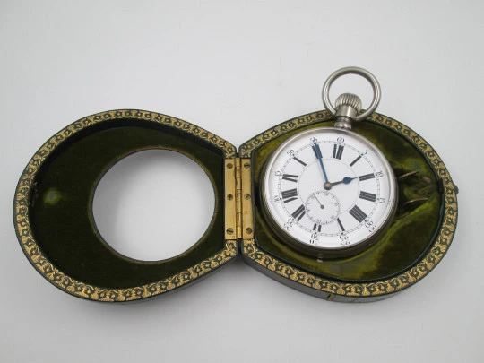 Longines travel watch with green leather case. Chromed steel. Remontoir. 1910's. Swiss