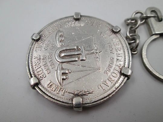 Men's keychain. Pure sterling silver. International Universal Trade Unit coin. 1976