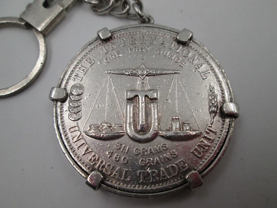 Men's keychain. Pure sterling silver. International Universal Trade Unit coin. 1976