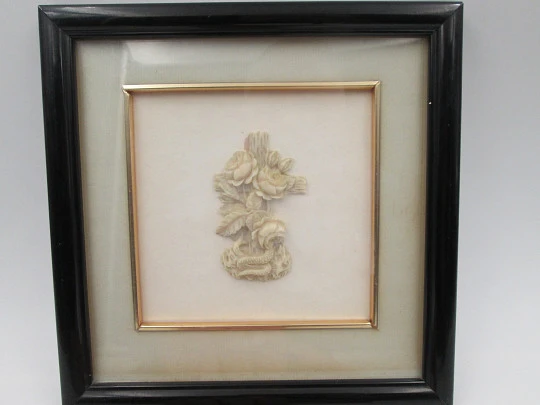 Miniature ivory openwork cross in wooden frame. Flowers, leaves and snake. 1930's