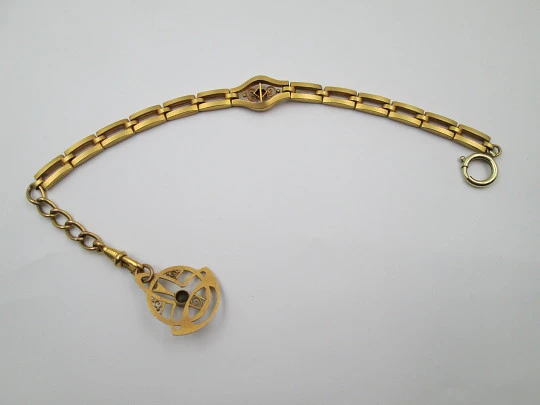 Modernist pocket watch chain with pendant. Gold plated metal and colours gems. 1920's