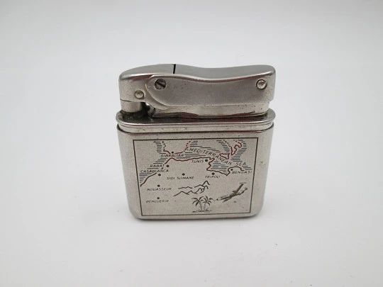 Mylflam Bob petrol pocket lighter. Silver plated metal. Europe-Africa map. Box. 1950's