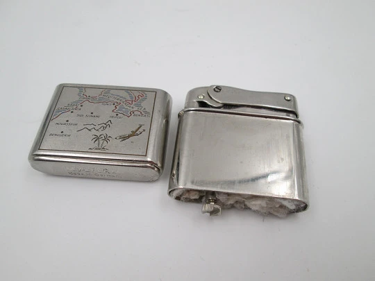 Mylflam Bob petrol pocket lighter. Silver plated metal. Europe-Africa map. Box. 1950's