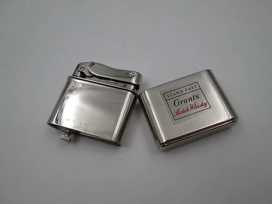 Mylflam Bob petrol pocket lighter. Silver plated metal. Whisky Grant's. West Germany. 1950's