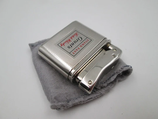 Mylflam Bob petrol pocket lighter. Silver plated metal. Whisky Grant's. West Germany. 1950's