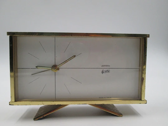 Obayardo musical alarm wind up clock. Bronze. White dial. Spain. 1960's