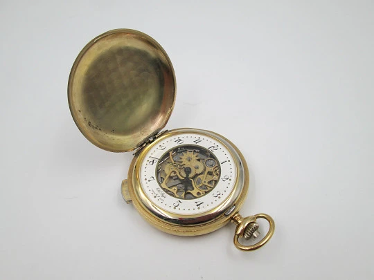 Old Style chiming pocket watch. Gold plated metal. Manual wind. Skeleton dial. 1960's