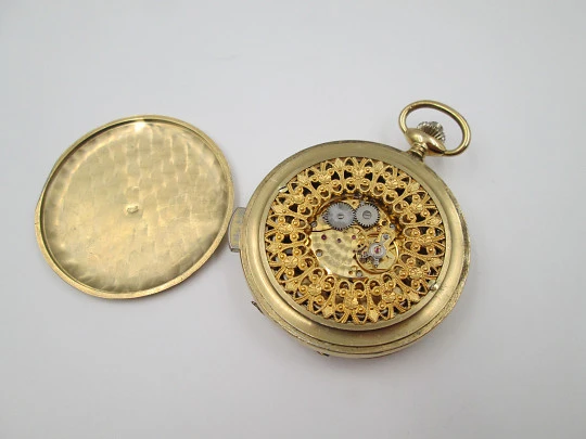 Old Style chiming pocket watch. Gold plated metal. Manual wind. Skeleton dial. 1960's