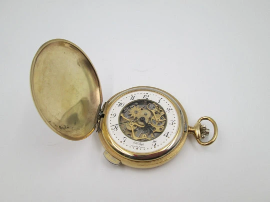 Old Style chiming pocket watch. Gold plated metal. Manual wind. Skeleton dial. 1960's