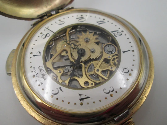 Old Style chiming pocket watch. Gold plated metal. Manual wind. Skeleton dial. 1960's