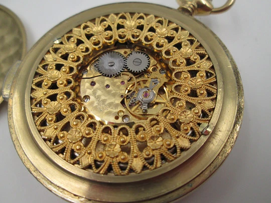 Old Style chiming pocket watch. Gold plated metal. Manual wind. Skeleton dial. 1960's