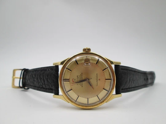 Omega Constellation certified chronometer. 18k yellow gold. Pie-pan faceted sphere