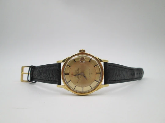 Omega Constellation certified chronometer. 18k yellow gold. Pie-pan faceted sphere