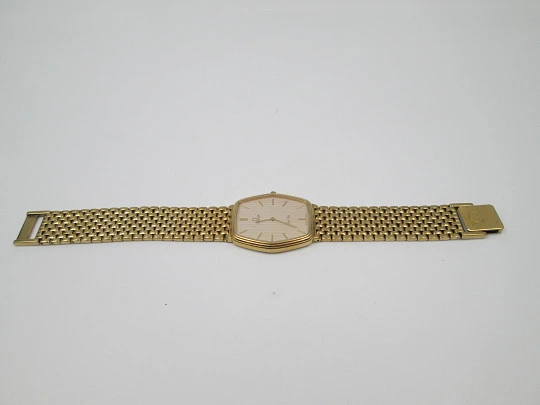 Omega De Ville. 20 microns gold plated and steel. Quartz. Bracelet. Swiss. 1980's