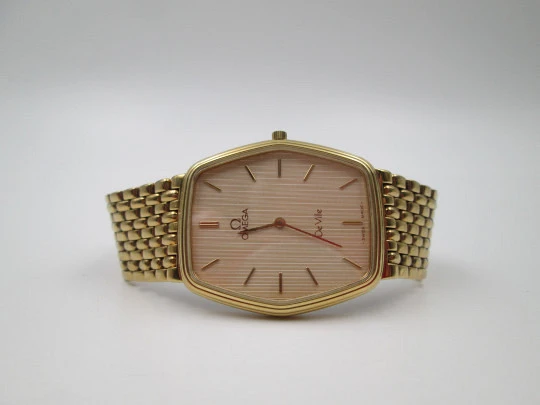 Omega De Ville. 20 microns gold plated and steel. Quartz. Bracelet. Swiss. 1980's