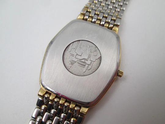 Omega De Ville. 20 microns gold plated and steel. Quartz. Bracelet. Swiss. 1980's