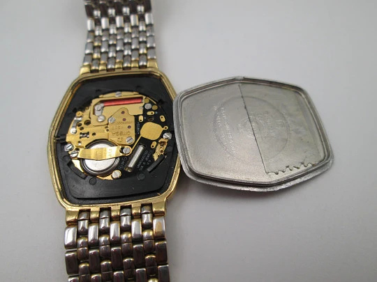 Omega De Ville. 20 microns gold plated and steel. Quartz. Bracelet. Swiss. 1980's