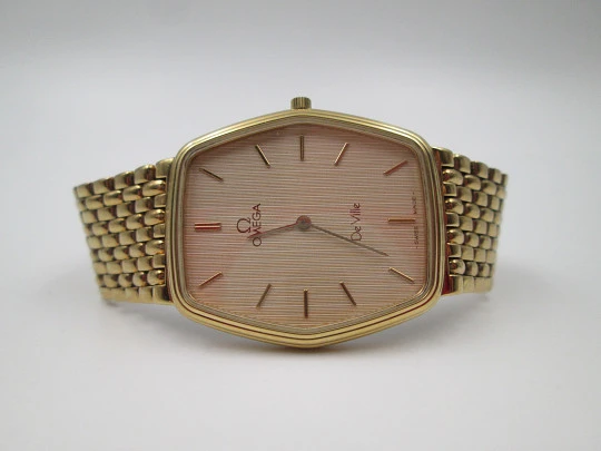 Omega De Ville. 20 microns gold plated and steel. Quartz. Bracelet. Swiss. 1980's