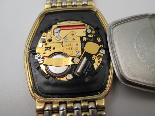 Omega De Ville. 20 microns gold plated and steel. Quartz. Bracelet. Swiss. 1980's