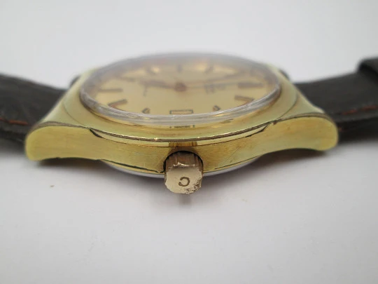 Omega Genève. 20 micron gold plated and steel. Automatic. Calendar. Strap. 1970's