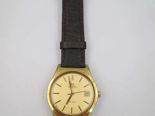 Omega Genève. 20 micron gold plated and steel. Automatic. Calendar. Strap. 1970's