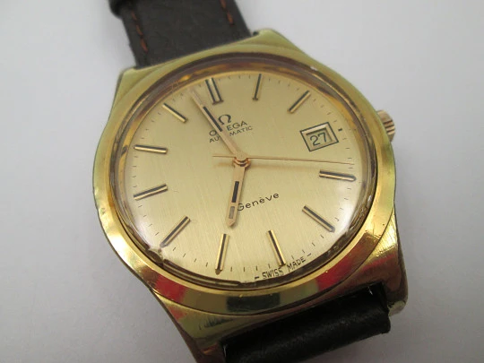 Omega Genève. 20 micron gold plated and steel. Automatic. Calendar. Strap. 1970's