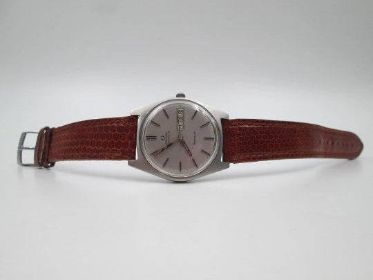 Omega Genève. Stainless steel. Automatic. Date & day. Leather strap. 1960's. Swiss