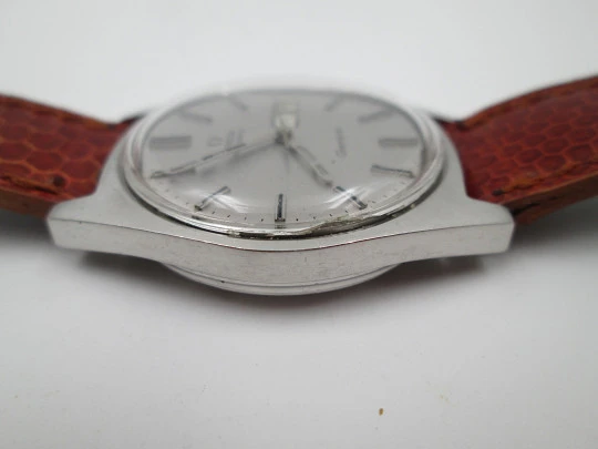 Omega Genève. Stainless steel. Automatic. Date & day. Leather strap. 1960's. Swiss